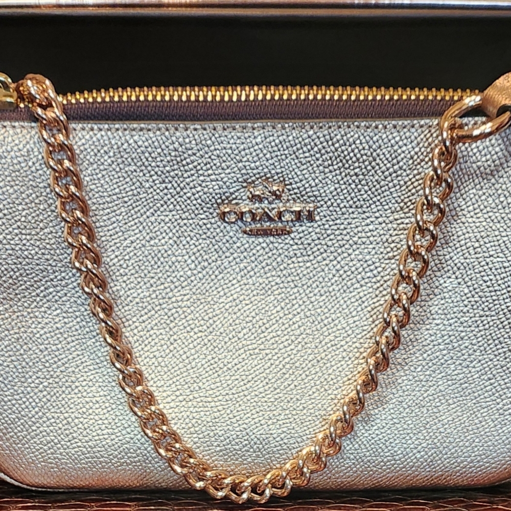 New eith box COACH Nolite Wristlet 19" Rose Metallic Leather with Chain Strap
